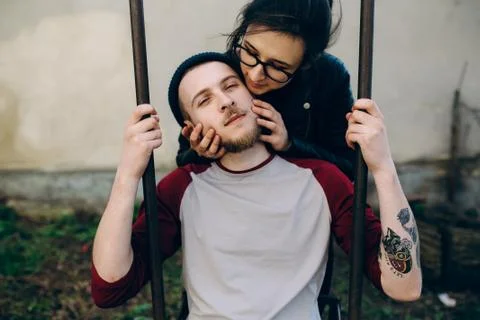 Couple on a swing Stock Photos