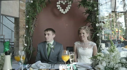 The couple at the table, wedding Stock Footage 64809313