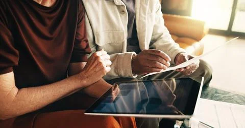 Couple, tablet and hands with document in home for mortgage chart, bills or.. Stock Photos