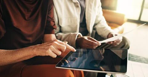 Couple, tablet screen and hands with document in home for mortgage, bills o.. Stock Photos