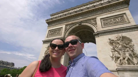 Couple taking selfie on Arc de Triomphe in Paris in 4k slow motion 60fps Stock Footage 109425870