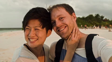 Couple taking selfie on beach Stock Footage 53090149