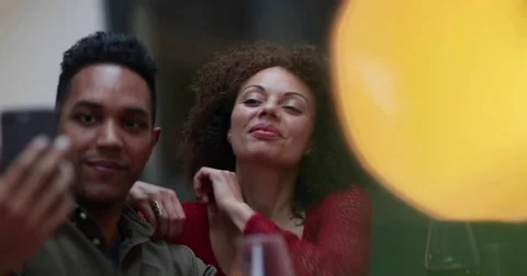 Couple taking a selfie at a celebration Stock Footage 80805836