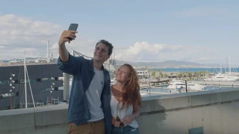 Couple taking a selfie in the city Stock Footage 143561908