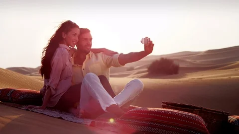 Couple taking selfie on desert. Stock Footage 119391494