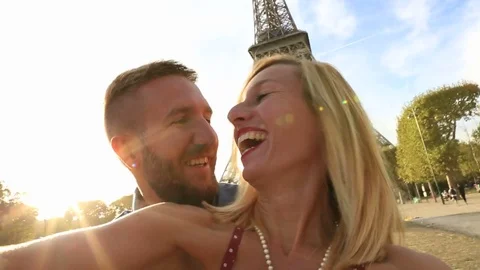 Couple taking selfie at the Eiffel tower, Paris Stock Footage 75996096