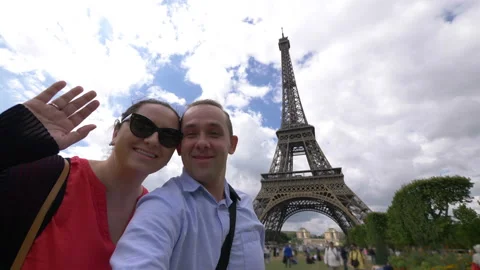 Couple taking selfie on Eiffel Tower in Paris in 4k slow motion 60fps Stock Footage 109423180