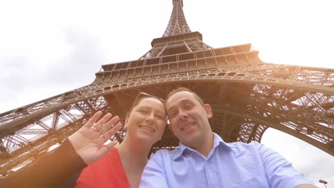 Couple taking selfie on Eiffel Tower in Paris in 4k slow motion 60fps Video stock 109427682