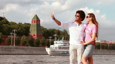 Couple taking selfie in front of Kremlin, Moscow, Russia. Stock Footage 51870727
