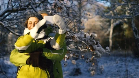 Couple taking selfie in the winter forest Stock Footage 100267064