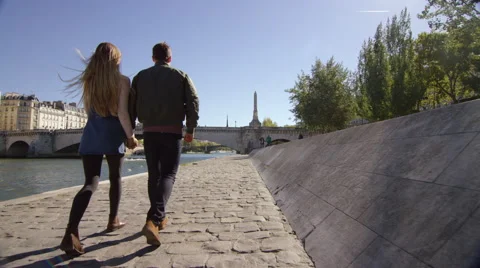 Couple taking a walk by the river. Stock Footage 63027074