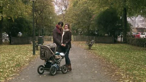 A couple taking a walk with their son Stock Footage 11289614