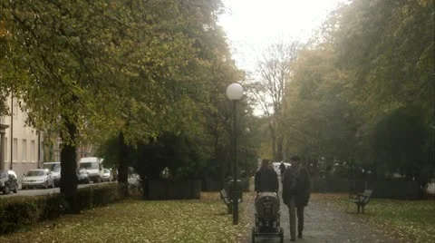 A couple taking a walk with their son Stock Footage 11289620