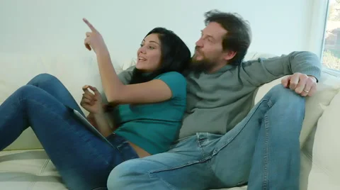 Couple talking about decorating apartment Stock Footage 60352947