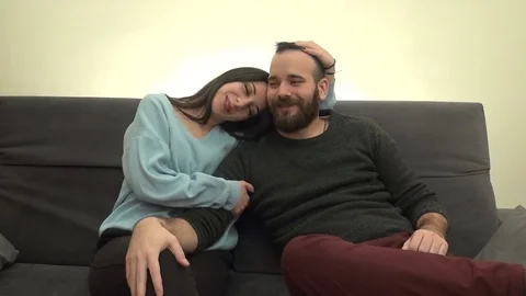Couple Talking and Laughing on the Couch Vidéo 74269963