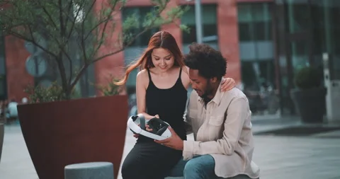 A couple talking and trying vr headset Stock Footage 201673387