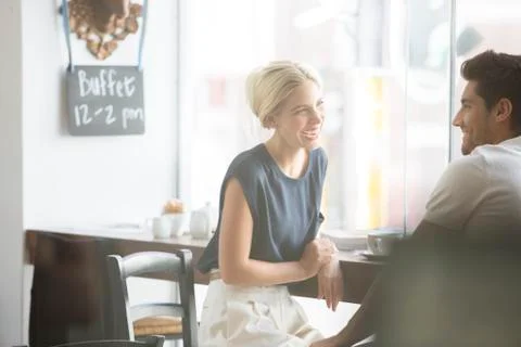 Couple talking in cafe Stock Photos