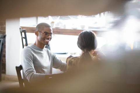 Couple talking in cafe Stock Photos