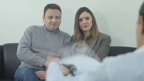 Couple Talking to Doctor Stock Footage 71798830