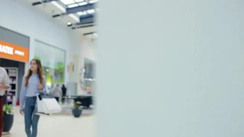 Couple talking in the mall Stock Footage 96743975