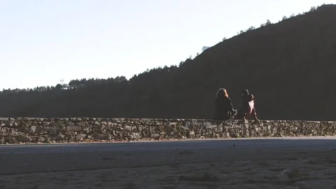 COUPLE TALKING IN THE MOUNTAIN Stock Footage 96383372