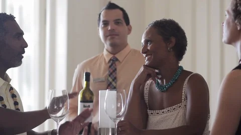 Couple talking over wine. 스톡 동영상 88371359