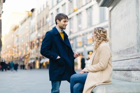 Couple talking at piazza, Firenze, Toscana, Italy Stock Photos