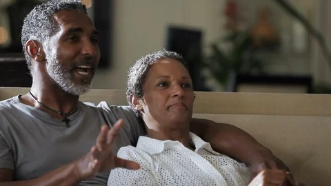 Couple talking on a sofa. Stock-Footage 88367391