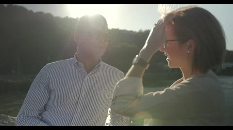 Couple talking in sunshine Video stock 40273854