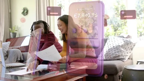 Couple tapping laptop and sorting bills, purple finance UI appearing over them Vídeo Stock 338365826