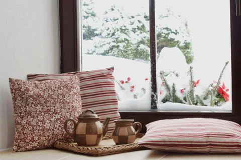 Couple of tea cups on the window, view to the winter garden Stock Photos