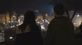 Couple of teenagers looking at night city lights, preparing to run away together HD Footage