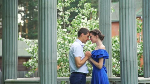 Couple Tender Touching Each Other in Spring Park Stock Footage 130732471