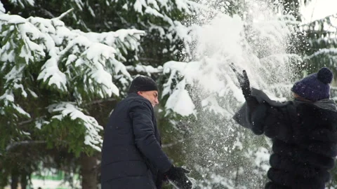Couple Throwing Snow on Each Other Vídeo Stock 98963759
