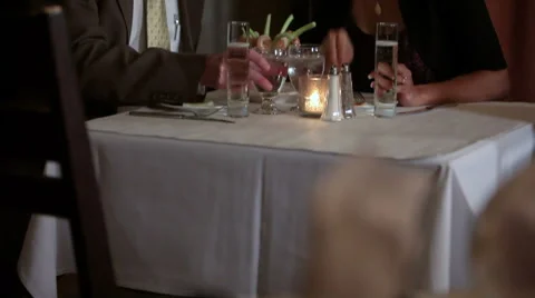 Couple toasts at restaurant Stock Footage 61663188