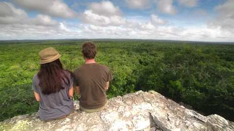 Couple on top of a maya temple Stock Footage 34336289