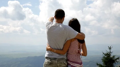 Couple at the top of the mountain Видео 95027254