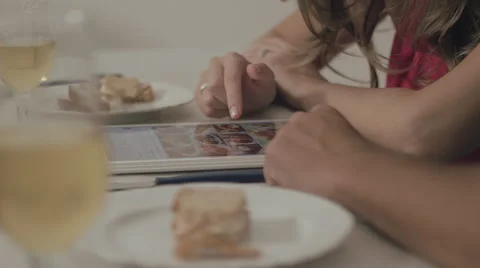 Couple touching the tablet to watch shows and movies on the Internet Video stock 59329921