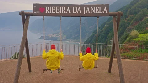 A couple of tourists on the Viewpoint from the swing in Ribera de Janela with an Stock Footage 270412141