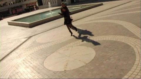 Couple in town, playing in square Stock Footage 43691151