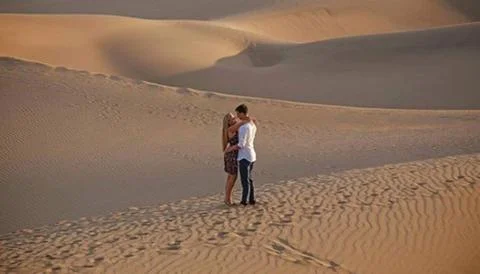Couple trip while make meet together Stock Photos