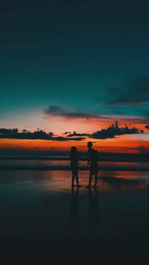 Couple under beautiful sunset Stock Footage 126132637