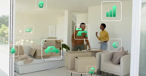 Couple unpacking and aligning frames on room wall, showing green water icon Stock Footage 316183431