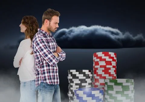 Couple upset back to back with 3D gambling poker chips Stock Photos