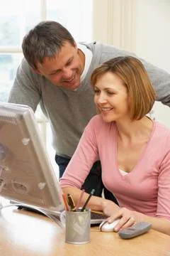 Couple Using Computer Stock Photos