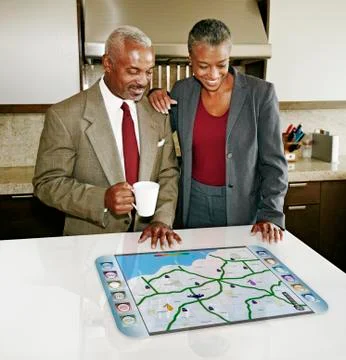 Couple using computer in table 스톡 사진
