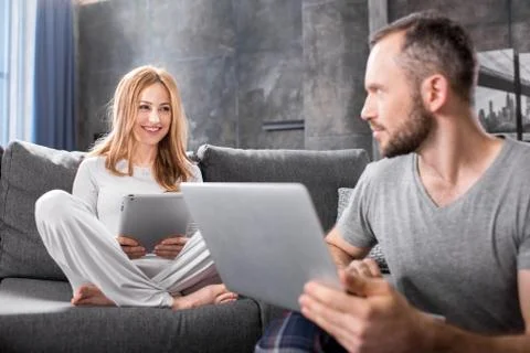 Couple using digital devices Stock Photos