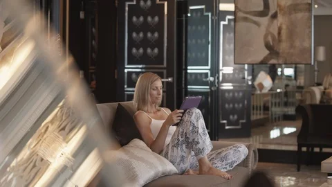 Couple using digital tablet at hotel. Stock Footage 119393412