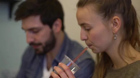 Couple using digital tablet together in cafe Stock Footage 63301220