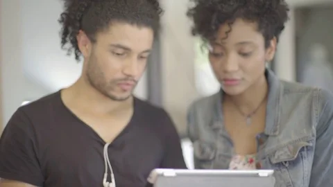 Couple using digital tablet together Stock Footage 75795033
